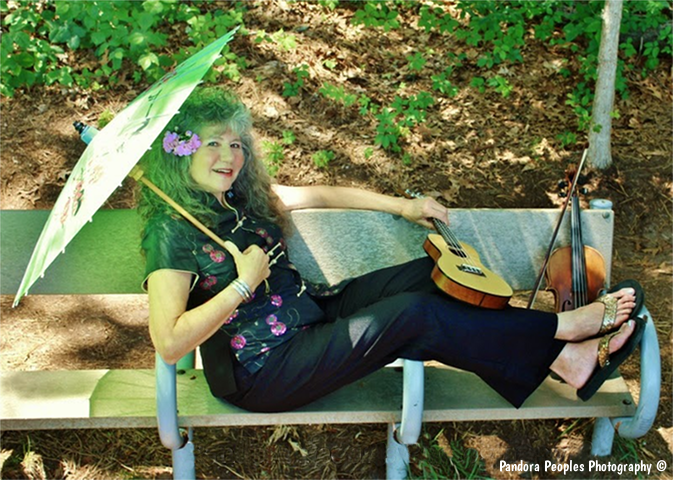 Denya posing with parasol on bench at Kent's Point